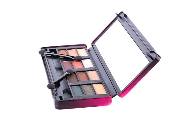 istock Side view. Lip gloss and brushes in one box isolated on white background. 1278474913