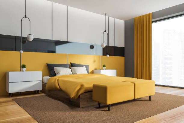 istock Yellow and gray master bedroom corner, window 1278476153