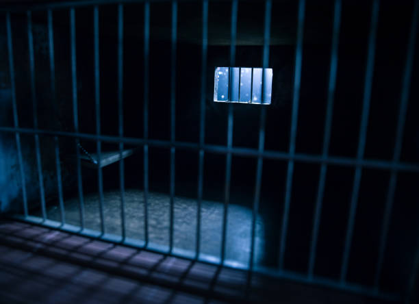 istock Jail or prison cell. Old grunge prison miniature. Dark prison interior creative decoration. Empty cell. Selective focus Obsolete gray grunge concrete room. 1278477168