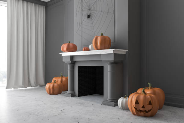 istock Gray fireplace with carved pumpkins, side view 1278478816
