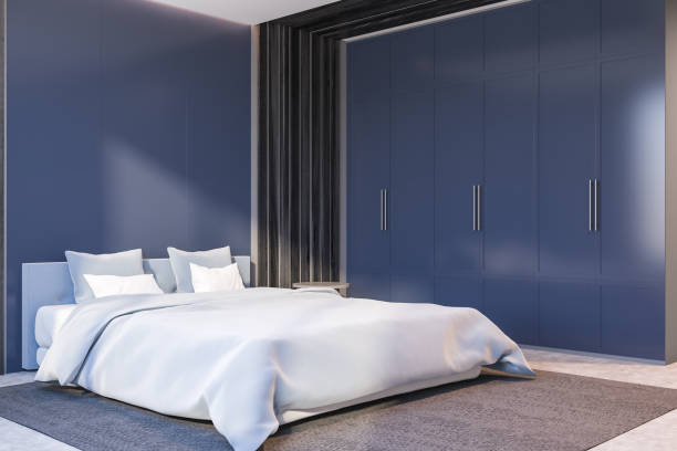 istock Grey and blue bedroom corner with wardrobe 1278478975