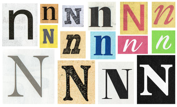 istock Paper cut letter N Old newspaper cutouts creative crafting 1278487919