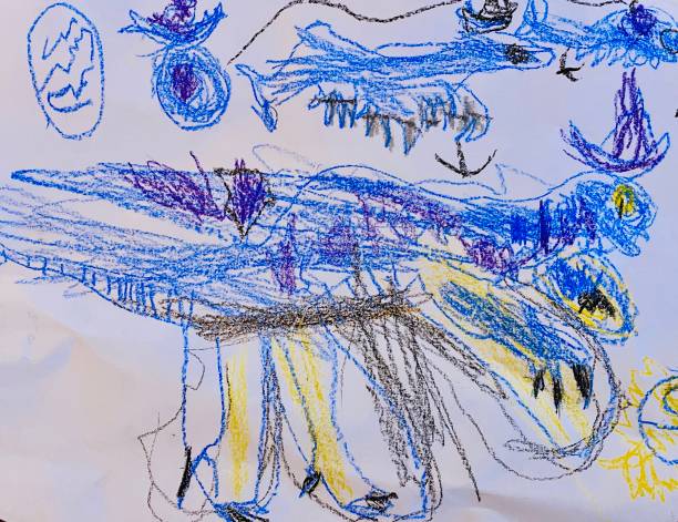 istock Child’s Drawing of Dragons in Blue Pencil 1278490371
