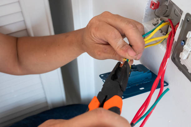 istock electrician install the outlet panel on the wall 1278491175