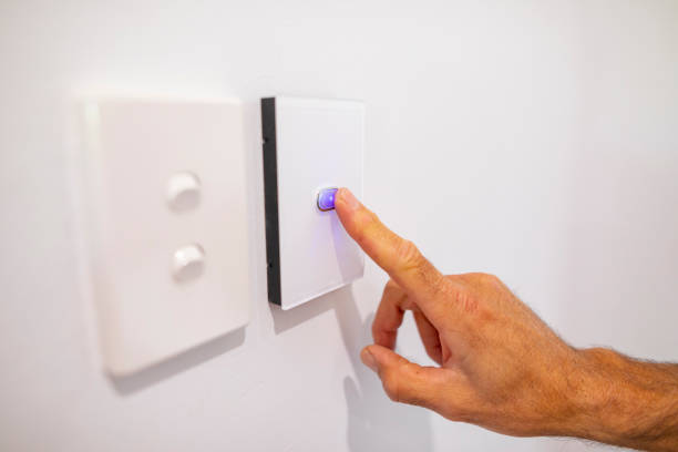 istock Middle Aged Man Using an Air Conditioner Thermostat 1278492047