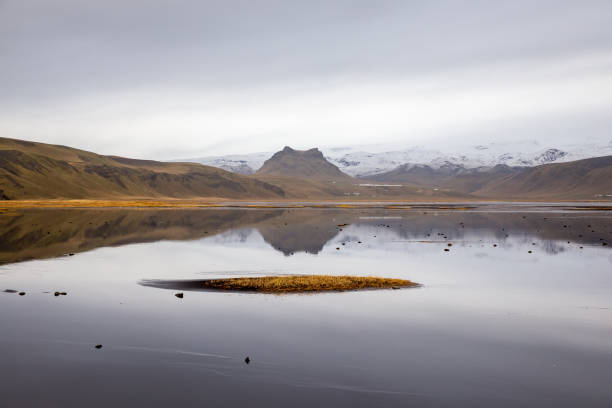 istock lake and mountains in Iceland 1278492907