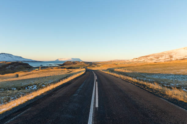 istock empty highway in golden sunrise 1278492916
