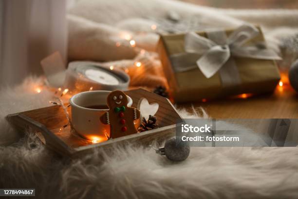 Warm Tea And Gingerbread Man Cookie For A Nicer Christmas Day Stock Photo - Download Image Now