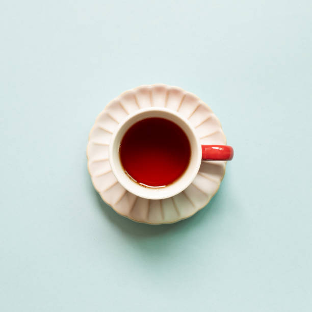 istock Cup of black tea on sky blue background. top view, copy space 1278496776