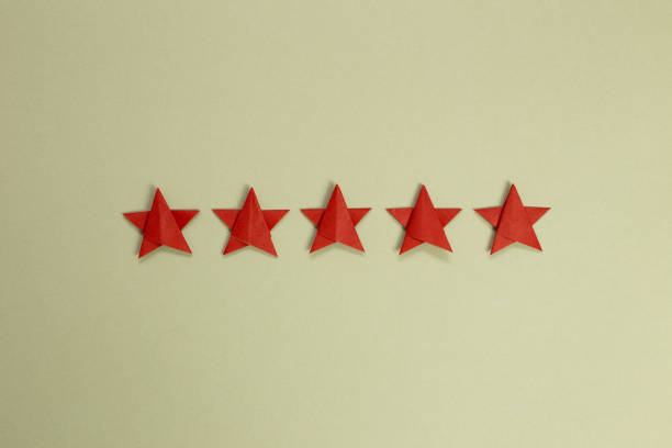 istock Five stars quality rating on khaki green background 1278497048