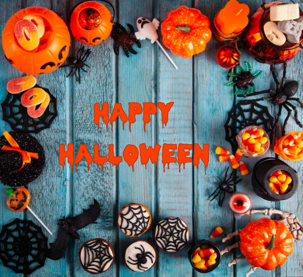 istock Halloween party decorations frame on blue wooden rustic table 1278497182
