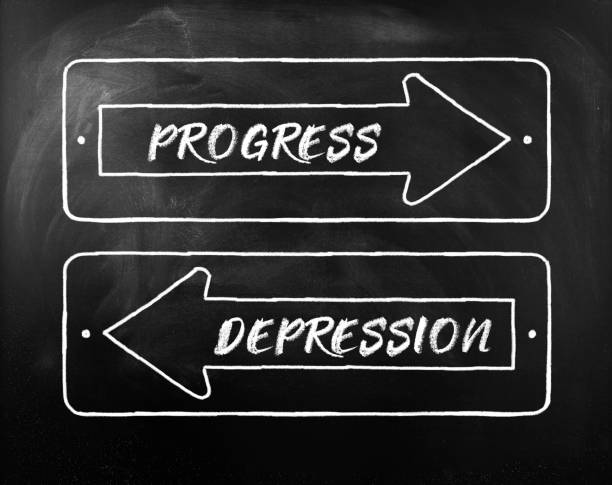 istock Choice Progress or Depression written on opposite arrows on Blackboard 1278497513