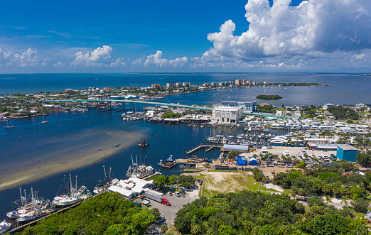 Aerial view of Fort Myers Beach, with inlet and bridge.