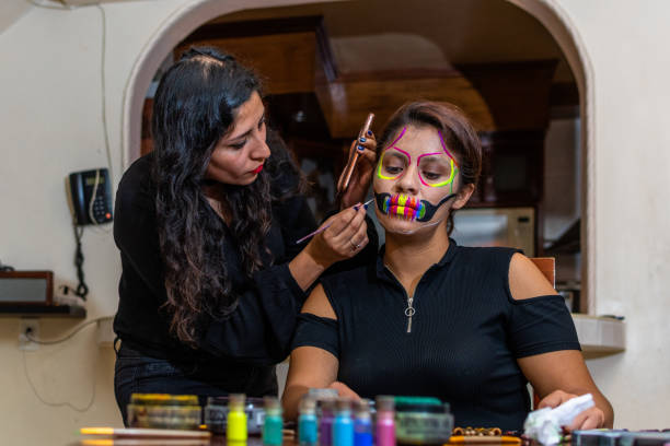 woman putting makeup on another woman