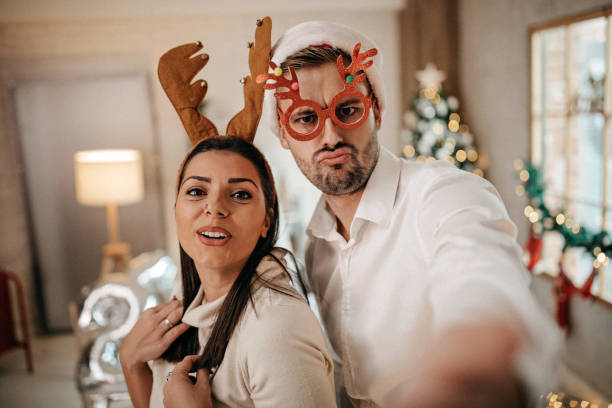 istock Smiled couple, ready for Christmas party 1278505902