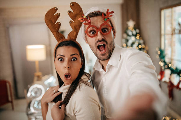 istock Smiled couple, ready for Christmas party 1278505959