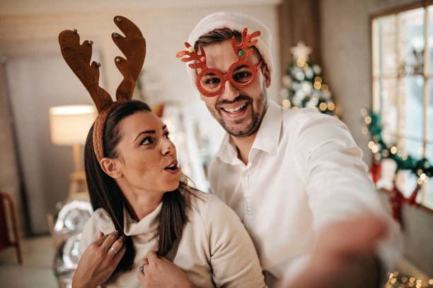 istock Smiled couple, ready for Christmas party 1278506606