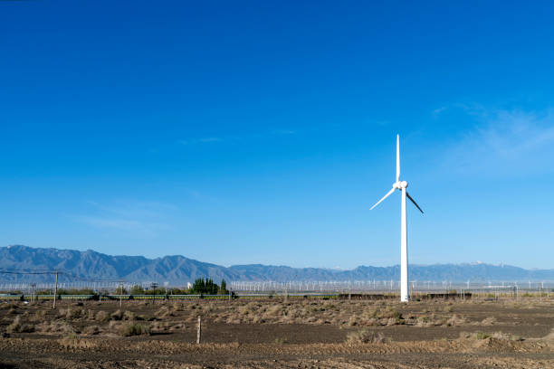 Wind turbines against a background of blue sky