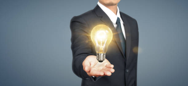 istock Hand of holding light bulb. idea innovation inspiration concept 1278511221