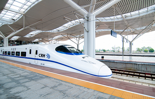 JUL 8, 2010 Changsha, China - China high speed train model CRH2C wait to departure under modern white roof structure of Changsha station