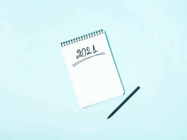 istock Top view of empty notebook ready for New 2021 Year planning or wish list 1278517397