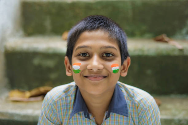 istock young indian child with indian flag on face 1278517522