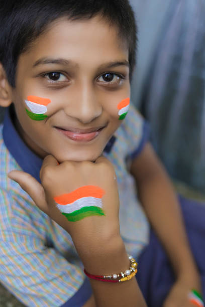 istock young indian child with indian flag on face 1278517561