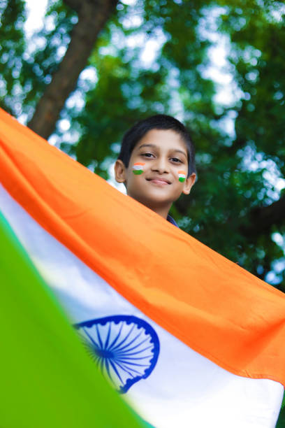 istock young indian child with indian flag on face 1278517597
