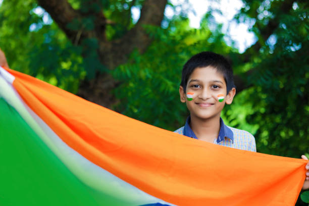 istock young indian child with indian flag on face 1278517621