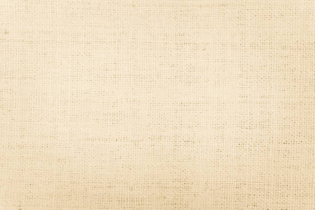 istock Brown Hemp rope texture background. Sackcloth or blanket wale linen wallpaper. Rustic sack canvas fabric texture in natural. Haircloth vintage linen burlap weaving, Old beige carpet background. 1278519191