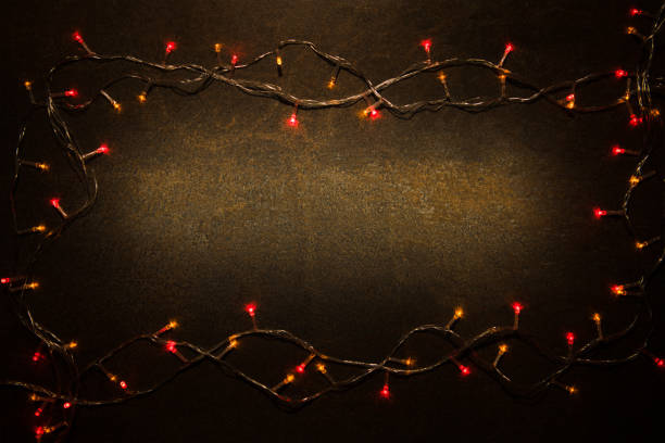 istock Christmas decoration light on stone background top view with copy space for frames, presents, and festive Christmas decoration 1278519221