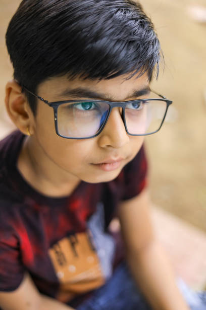 istock Cute little Indian / Asian boy wearing spectacles 1278521125
