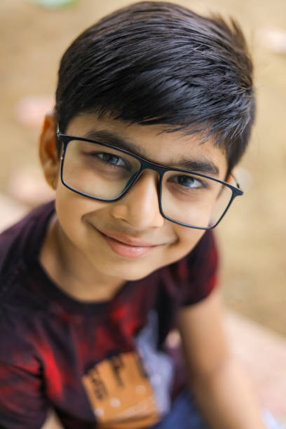 istock Cute little Indian / Asian boy wearing spectacles 1278521127