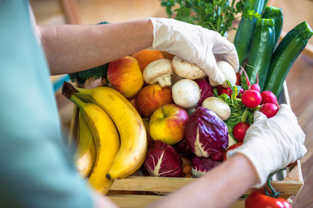 istock Box With Fresh Fruits And Vegetables 1278527346