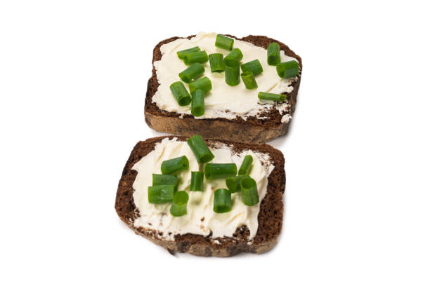 istock Brown bread and cheese isolated on white background. 1278529601