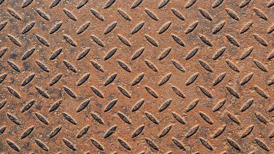 A corroded metal pattern. A seamless rusted metal plate. Abstract metallic background. An interesting old steel pattern for your projects.