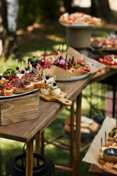istock wooden buffet table with snacks, appetizer and fruits 1278534172