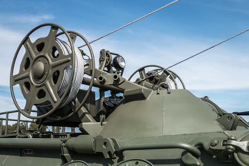 winch with a cable for self-healing is installed on military or construction equipment