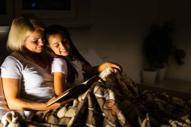 istock Mother And Daughter Learning To Read At Home 1278534523