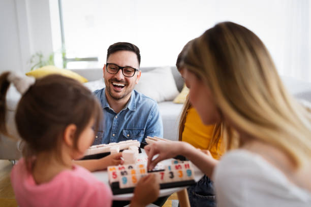 istock Happy family having fun time at home 1278539624