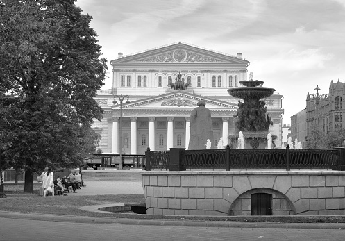 Bolshoi theater building, Karl Marx sculpture, round fountain. Black and white tone