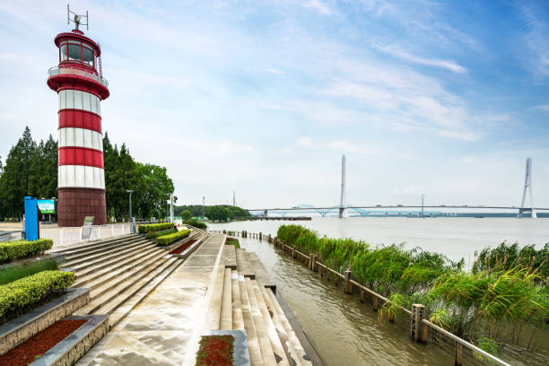 istock Lawn and lighthouse in Riverside Wetland Park, Nanjing, China 1278541237