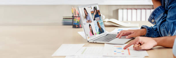 istock New normal office lifestyle.asian creative designer video conference collaboration with colleagues.live streaming meeting.banner mockup for display of content 1278544346