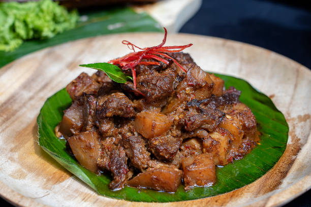 istock Indonesian dish - fried meat in chili sauce, closeup 1278546140