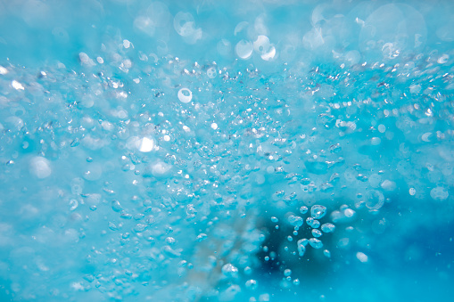 Beautiful water waves -  Splashed water wave in clean blue water, clean filtered water ready for drinking
