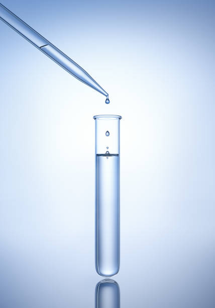 Test tube with pipette Test tube with pipette and droplets with reflecting blue background tube stock pictures, royalty-free photos & images