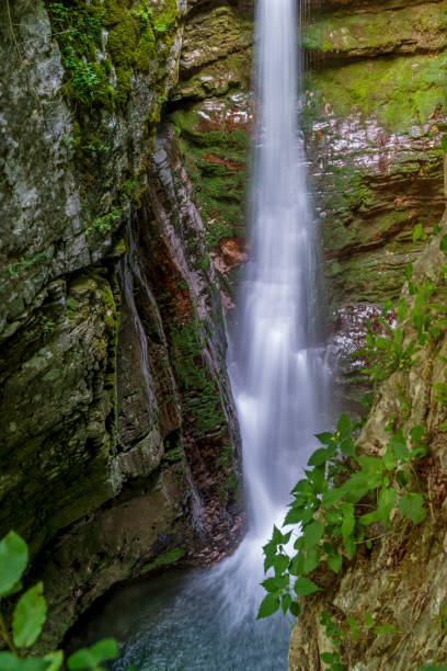 istock High waterfall in the mountain canyon. 1278554628