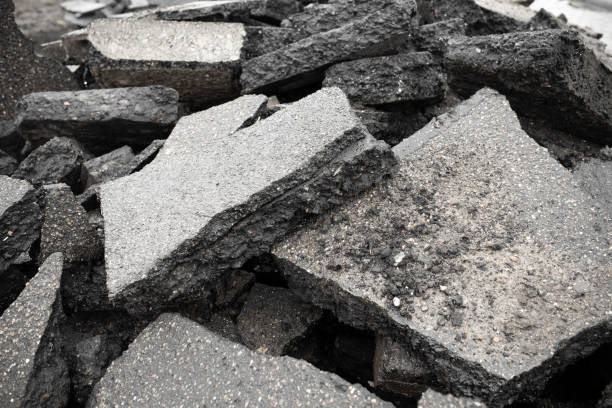 istock Demolished asphalt surface - large pieces on the pile 1278563108