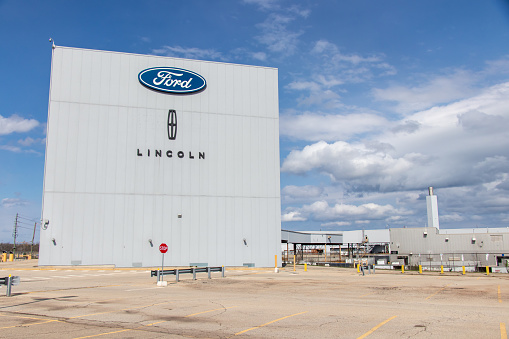Ford and Lincoln signs atop of the main factory building at their Oakville Assembly Complex.