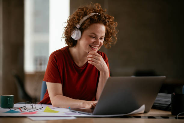 istock Beautiful businesswoman working on project. 1278570094